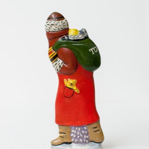 Father Christmas with teddy in back pocket