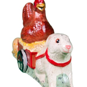 Rabbit Pulling Hen in Wagon Laying Eggs