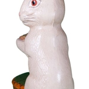 White Rabbit Standing by Basket Holding Nest