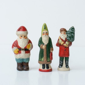 Set of Four Mini Father Christmas Figures matched numbered sets