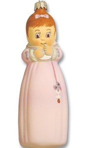 Baby in pink dress