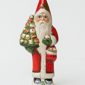 Santa Holding Tree of Ornaments