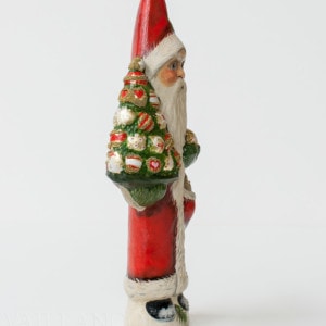 Santa Holding Tree of Ornaments