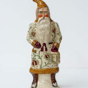 Santa in White Brocade with Lantern