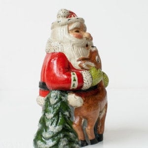Small Santa Hugging Deer