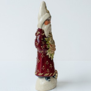 Father Christmas with beaded burgundy coat