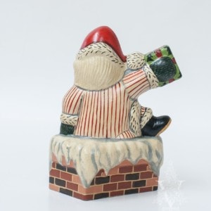 Striped Santa in Chimney With Present