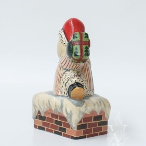 Striped Santa in Chimney With Present