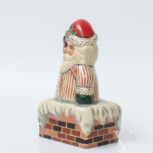 Striped Santa in Chimney With Present