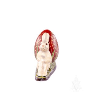 Two Bunnies Leaning Against Egg