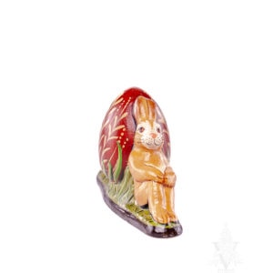 Two Bunnies Leaning Against Egg