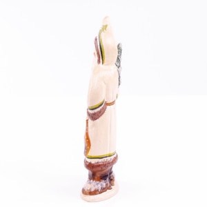 White Coat Father Christmas Holding Tree