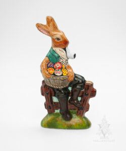 Rabbit Sitting on Fence with Eggs and Pipe