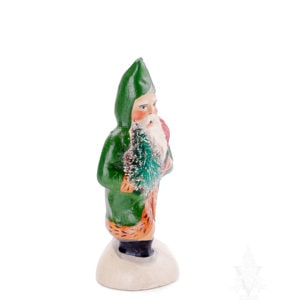 Small Green Father Christmas Trudging Thru Snow
