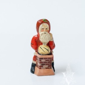 Santa Pushing Sack into Chimney