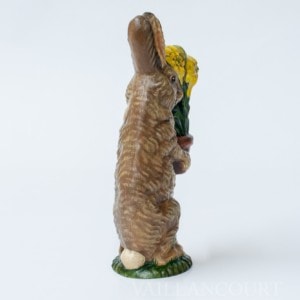 Bunny Carrying Yellow Lily In Clay Pot