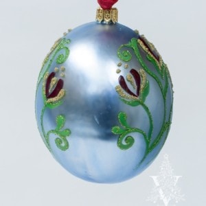 Jingle Balls™ Pearlized Santa in Red Holding Swag of Ornaments