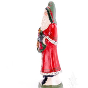 Grand Colonial Santa with Pineapple And Fruit Wreath