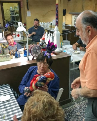Sue receiving a retirement gift, a Vaillancourt one of a kind with elements from every employee at Vaillancourt.