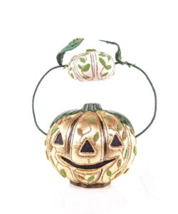 Large Golden Pumpkin Holding Small Pumpkin