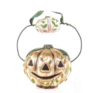 Large Golden Pumpkin Holding Small Pumpkin