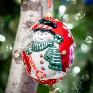 Jingle Balls™ Snowman with Shovel on Pearlized Red