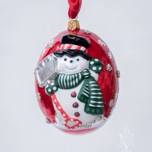 Jingle Balls™ Snowman with Shovel on Pearlized Red