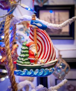 Santa on St. Nicholas Sailboat with Nantucket Whale Flag