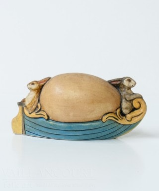 Two Bunnies in Small Egg Boat