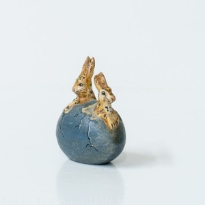 Two Tiny Bunnies in Cracked Blue Egg