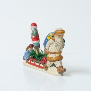2001 Starlight with American Santa Ornament and Angel pushing Sled.