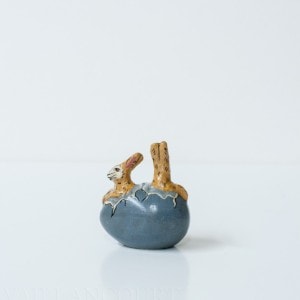Two Tiny Bunnies in Cracked Blue Egg
