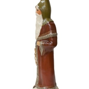 Father Christmas Window Display in Green Hood with Toys