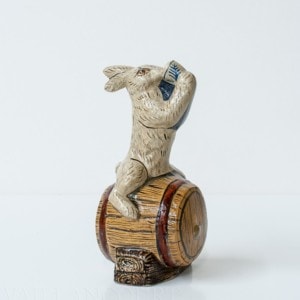 Rabbit Sitting on Barrel Drinking
