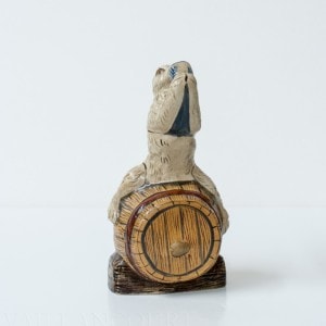 Rabbit Sitting on Barrel Drinking
