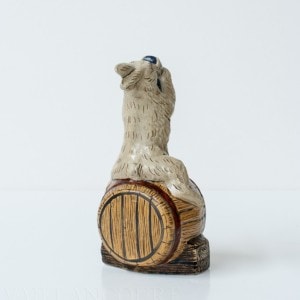 Rabbit Sitting on Barrel Drinking