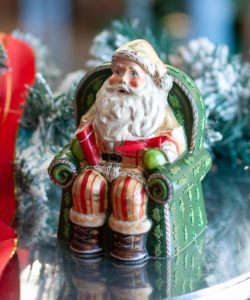 Gold Santa With Shopping Catalog