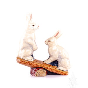 Two Rabbits on See-Saw