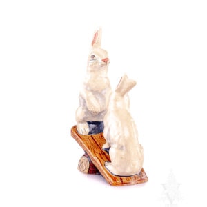 Two Rabbits on See-Saw