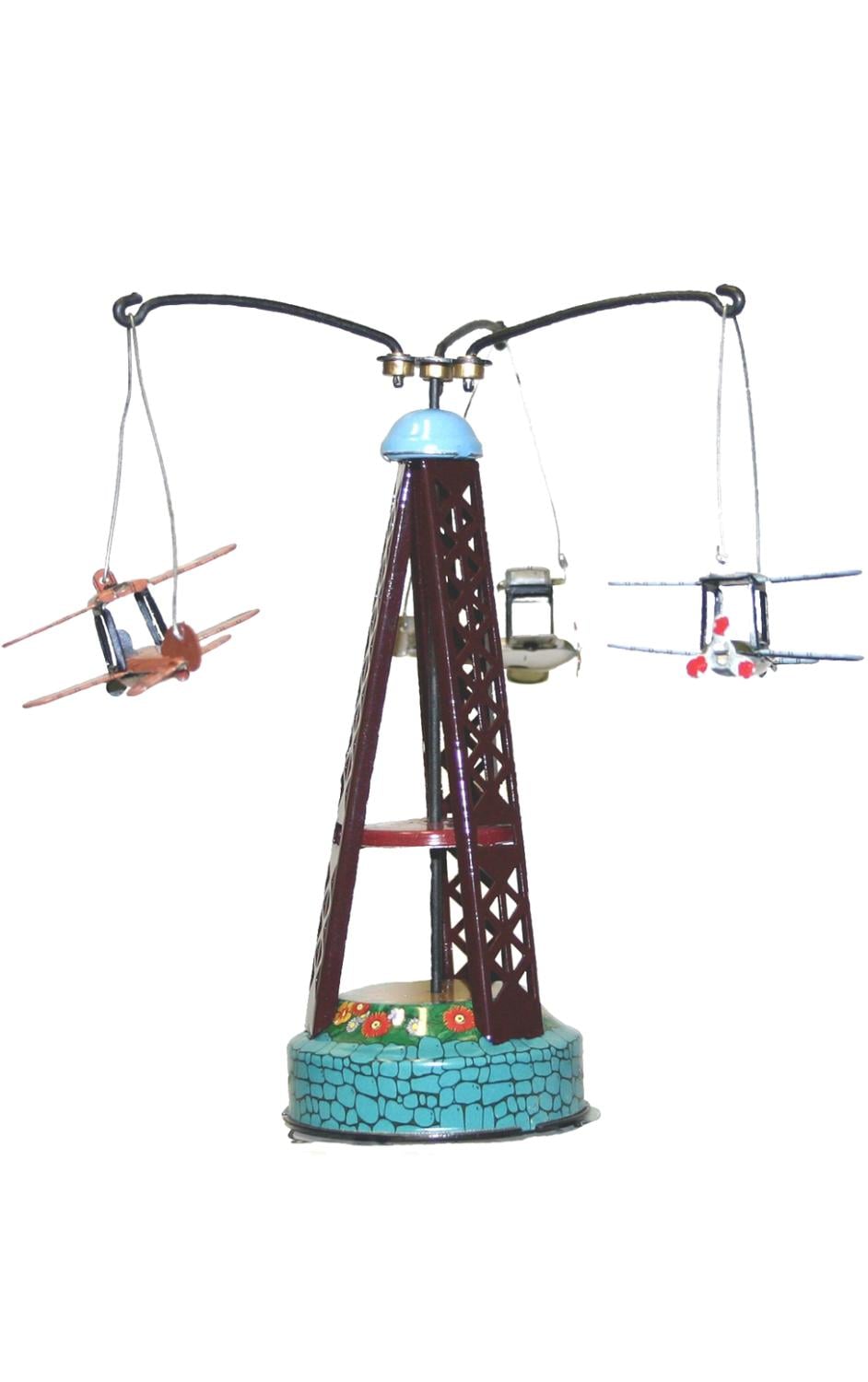Biplane Carousel Tin Toy